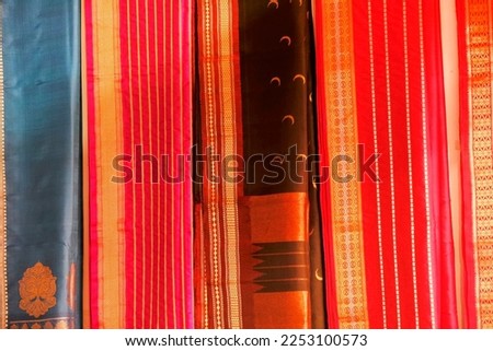 Pallet of vivid and colorful Indian Sari, India textile, selective focus.