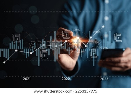 Oil energy graph world market, impact on the economy, Businessman touch chart on the oil price, crude fuel transportation to resources customers. Economic crisis, inflation and rising energy prices.
 Royalty-Free Stock Photo #2253157975