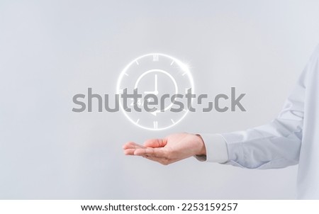 Doctor in a white coat uniform holding 24-7 service icon for assistance patient when accident or emergency, Medical call center service without interruption day and night.  Royalty-Free Stock Photo #2253159257