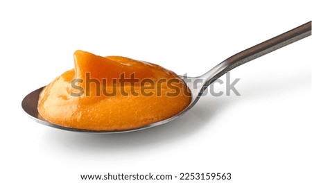 vegetable puree in spoon isolated on white background Royalty-Free Stock Photo #2253159563