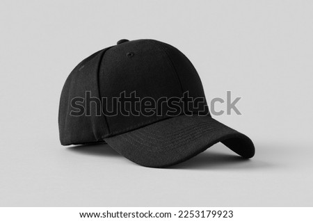 Black baseball cap mockup on a grey background. Royalty-Free Stock Photo #2253179923