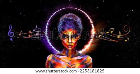 Girl with musical notes for the cover of video clips. Wallpaper for canvas prints with woman with body paints. Art makeup and bodyart. Cover art for your mixtape or song. Design for book cover.