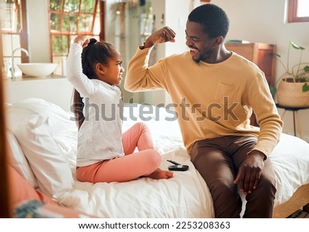 Healthcare, diabetes and muscle of father and girl in bedroom for brave, proud and strong gesture. Love, family home and dad helping child with monitor for glucose, sugar level test and insulin Royalty-Free Stock Photo #2253208363