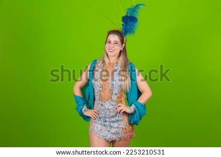 Photo of blonde dancer woman on green background