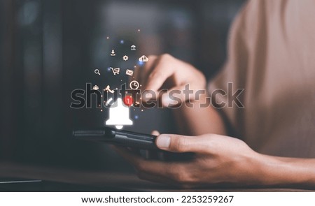 The smartphone and the bell icon show notifications of new messages,internet application notification concept,Cyberspace Communications, Connected Inboxes, Chats, Messages, and Apps Royalty-Free Stock Photo #2253259267