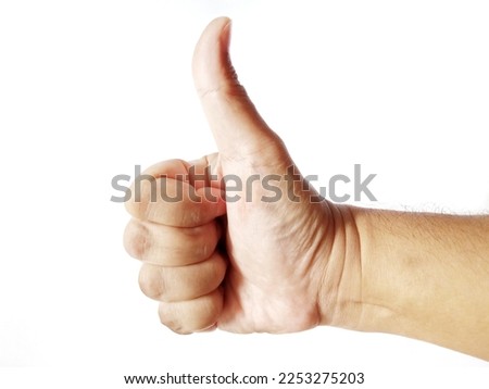 An asian man hand showing a thumb up sign, isolated on white background
