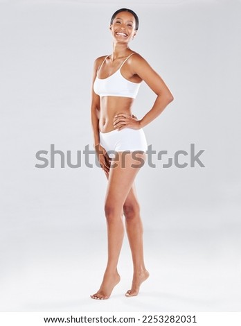 Full body, standing in underwear and woman with smile in portrait for fitness, health and wellness isolated on studio background. Diet and exercise, healthy lifestyle mockup and weightloss