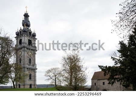 Architectural detail of the Belfry of Mons, the only belfry in Belgium constructed in Baroque style (inscribed on the UNESCO World Heritage on 1999), part of the major cultural patrimony of Wallonia Royalty-Free Stock Photo #2253296469