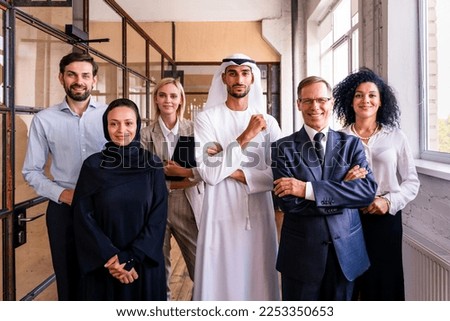 Multiethnic corporate business team meeting in the office for a strategic marketing plan - Office workers, entrepreneurs and company employee at work in a multinational company Royalty-Free Stock Photo #2253350653