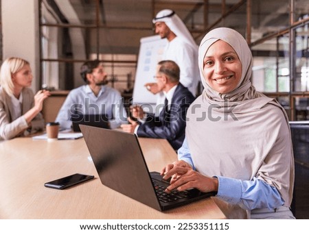 Multiethnic corporate business team meeting in the office for a strategic marketing plan - Office workers, entrepreneurs and company employee at work in a multinational company Royalty-Free Stock Photo #2253351115