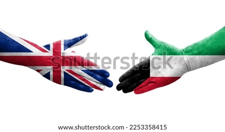 Handshake between Kuwait and United Kingdom flags painted on hands, isolated transparent image.