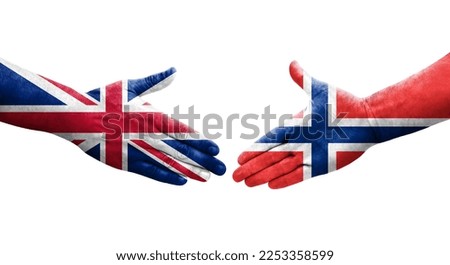 Handshake between Norway and United Kingdom flags painted on hands, isolated transparent image.