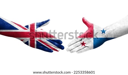 Handshake between Panama and United Kingdom flags painted on hands, isolated transparent image.