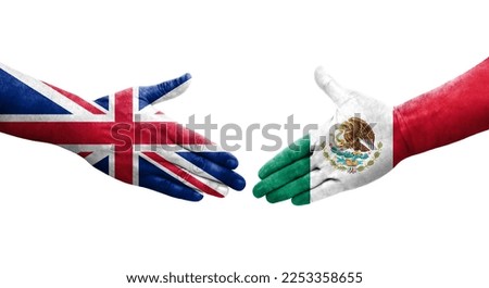 Handshake between Mexico and United Kingdom flags painted on hands, isolated transparent image.