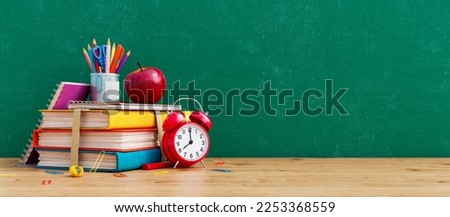 Ready for school concept background with books, alarm clock and accessory 3D Rendering, 3D Illustration Royalty-Free Stock Photo #2253368559