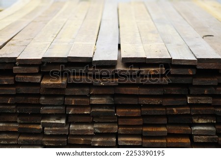 Outdoor lumber storage for the timber industry. Wood processing for transportation.
