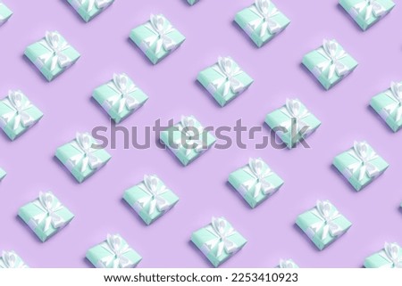 Many gifts on lilac background. Pattern for design