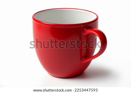 Close up huge red mug. Red cup for tea or soup isolated on white background with clipping path. Red coffee cup mockup. Royalty-Free Stock Photo #2253447593