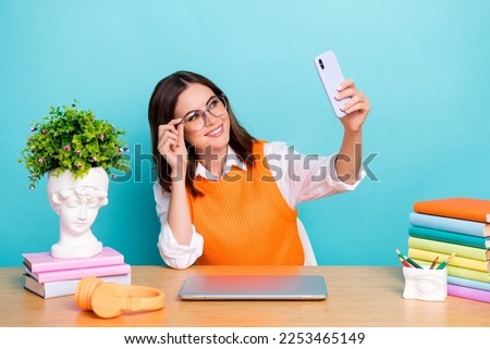 Photo of intelligent lovely lady shooting recording video chatting followers social media home office isolated on cyan color background