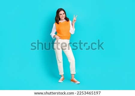 Full body size photo cadre of young peaceful lady wear formal uniform schoolgirl teacher trendy show v-sign isolated on aquamarine color background