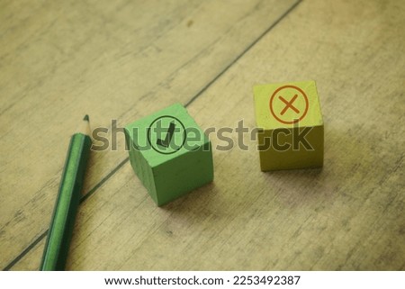 Selective focus image of wooden block with true and false icon