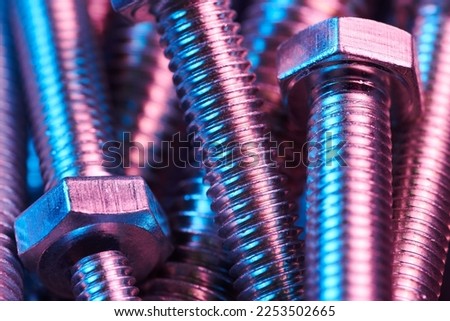 Set of bolts nuts nails metal fasteners. Consumable hardware tools. assortment steel screws collection close up background Royalty-Free Stock Photo #2253502665
