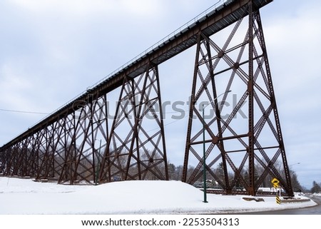 View of the 1908 railway trestle bridge seen from Chaudière boulevard during a winter morning, Cap-Rouge area, Quebec City, Quebec, Canada Royalty-Free Stock Photo #2253504313