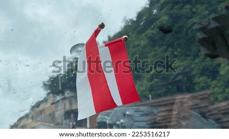 Looks beautiful, the red and white Indonesian national flag flutters two in the car