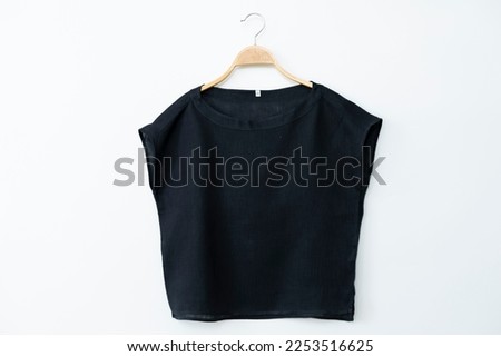 Woman black blouse isolated on white background. Royalty-Free Stock Photo #2253516625