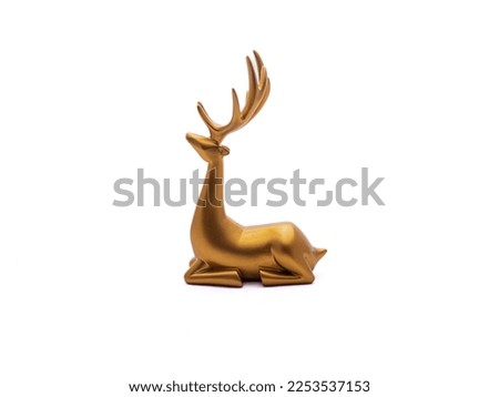 Metallic Deer in gold color Antique Royalty-Free Stock Photo #2253537153