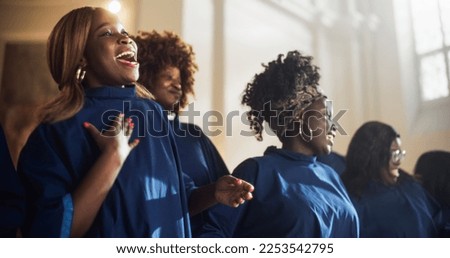 Black Christian Gospel Singers in Church Clapping and Stomping, Praising Lord Jesus Christ. Song Spreads Harmony Joy and Faith. Energetic Choir Sharing the Message of Christianity with Uplifting Music