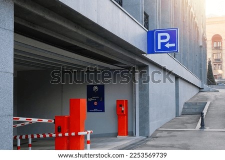 An entrance to an underground parking in a business center or commercial building.