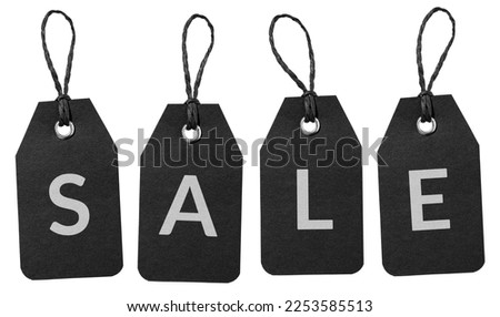 SALE word on black price tag set with string isolated on white background. Sale sign