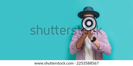 Funny portrait of an emotional hipster guy with a megaphone. Collage in magazine style. Flyer with trendy colors, advertising copy space. Discount, sale season. Information concept. Attention news! Royalty-Free Stock Photo #2253588567