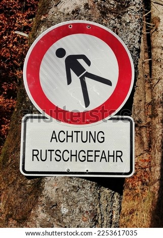 Traffic sign Attention danger of slipping
Translation german - english: Attention danger of slipping