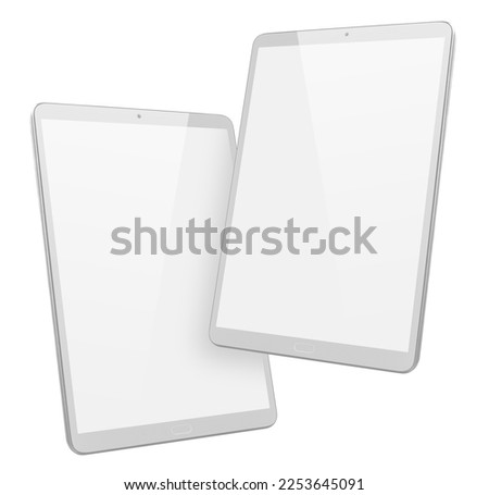 Two white tablet computers, isolated on white background