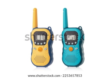 Portable radios Walkie talkie isolated on white background, color mobile phone kids toys Royalty-Free Stock Photo #2253657853