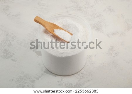 Sodium Benzoate, sodium salt of benzoic acid in plastic container. Chemical formula C6H5COONa. Food additive E211, Preservative. It has a strong depressing effect on yeast and mold fungi.