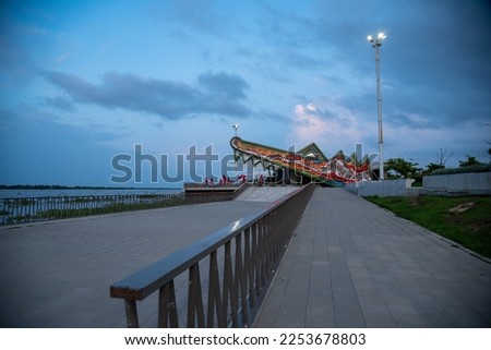 Area of restaurants and bars known as Caiman del Río on the Malecón in Barranquilla. Colombia. Royalty-Free Stock Photo #2253678803