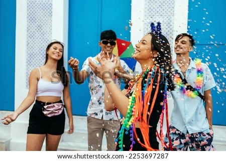Brazilian Carnival. Group of friends celebrating carnival party Royalty-Free Stock Photo #2253697287
