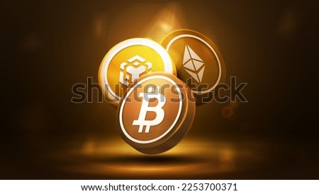 Gold 3D coins of Bitcoin, BNB and Ethereum on a dark and gold blurred background. Digital Cryptocurrency poster Royalty-Free Stock Photo #2253700371