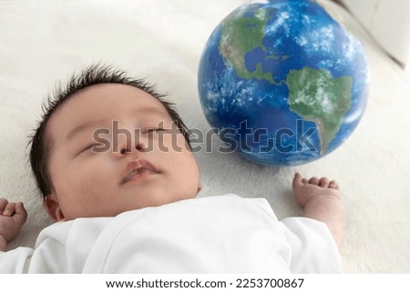 Baby and globe (0 years and 1 month, Japanese, boy)