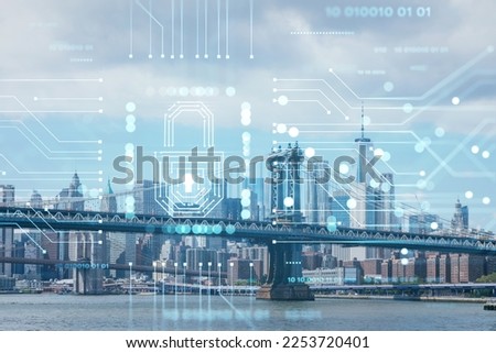 Brooklyn and Manhattan bridges with New York City financial downtown skyline panorama at day time over East River. The concept of cyber security to protect confidential information, padlock hologram