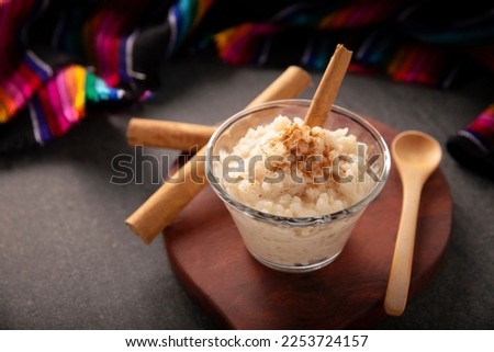 Rice pudding. Sweet dish made by cooking rice in milk and sugar, some recipes include cinnamon, vanilla or other ingredients, it is a very easy dessert to make and very popular all over the world. Royalty-Free Stock Photo #2253724157
