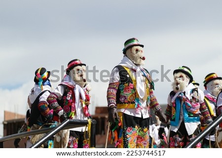 Beautiful pictures of folkloric dancers dancing the "Tunantada" in traditional dress, representing Peruvian culture.