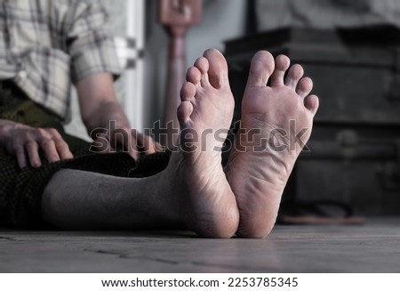 Foot of Asian adult man. Concept of foot care, pain, weakness and health.