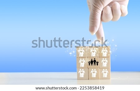 Concept of health (medical) and life insurance for the entire family. Doctor practitioner with protective gesture and family icon.