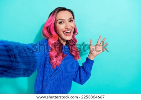 Closeup photo selfie of youngster hipster excited good mood girl wavy dyed hair raise palm hello sign person blog isolated on cyan color background