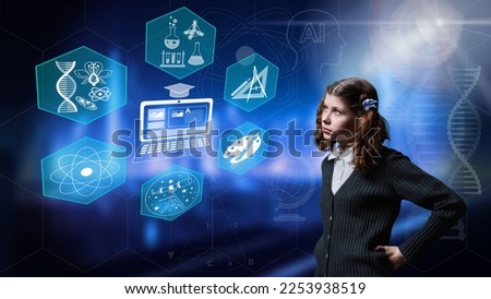 Attentive preteen schoolgirl looking at digital screen with educational symbol