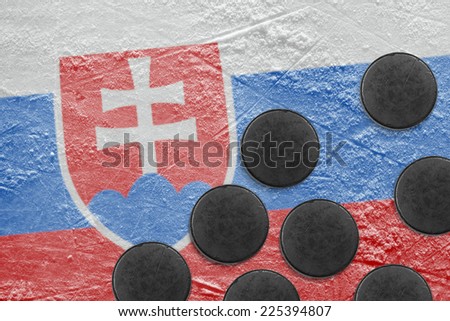 Washers and the image of the Slovak flag on a hockey rink